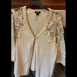 Sweater with lots of detail.